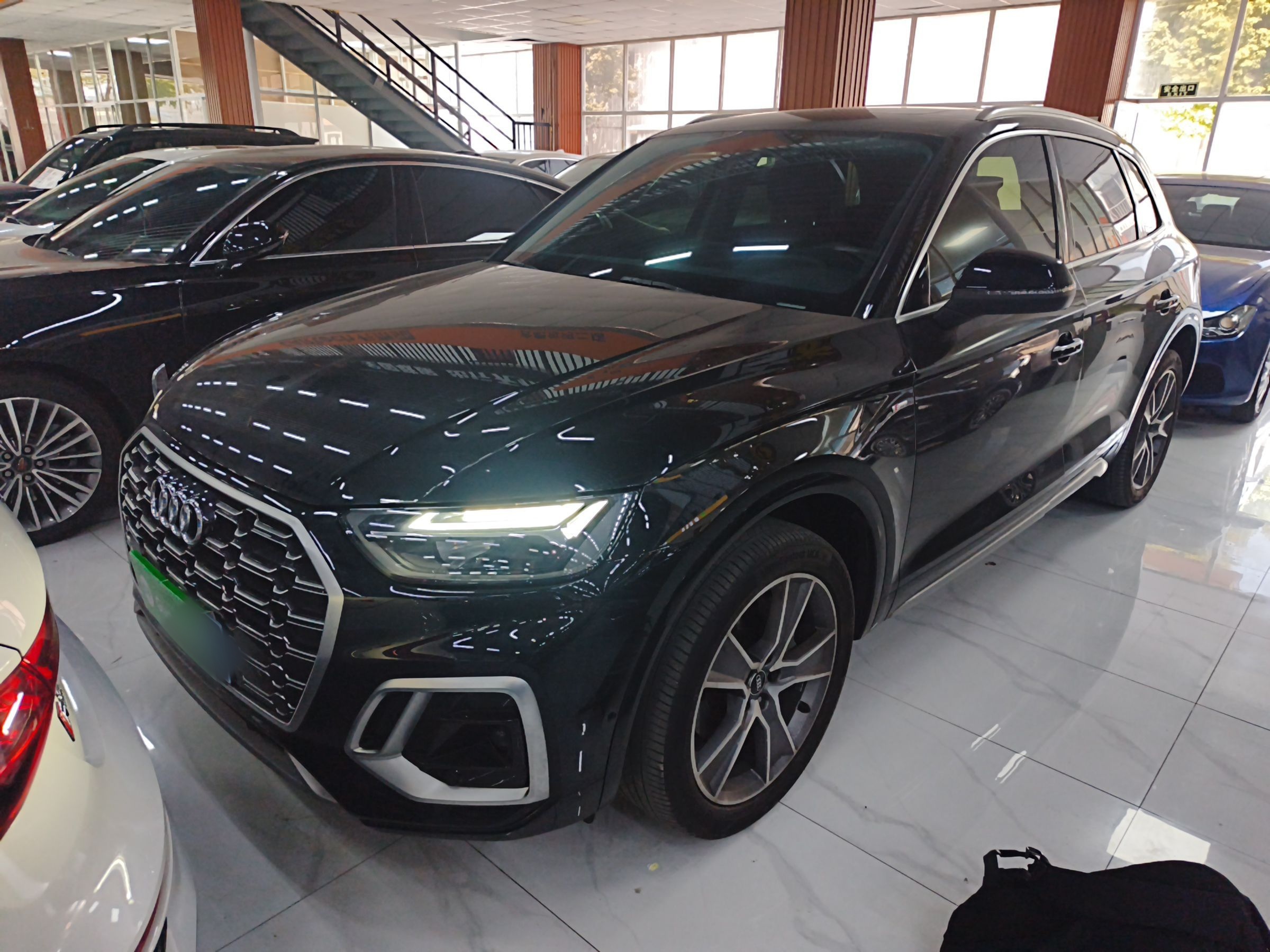 Под передней частью автомобиля