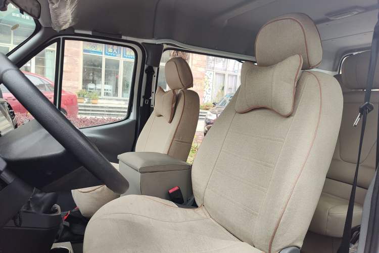 Used JMC Transit 2019 2.8T Commercial Version Intelligent Automatic Transmission Short Wheelbase Mid-Roof Design 6 Seats China VI Emission Standard – JX493 Left Front Seat