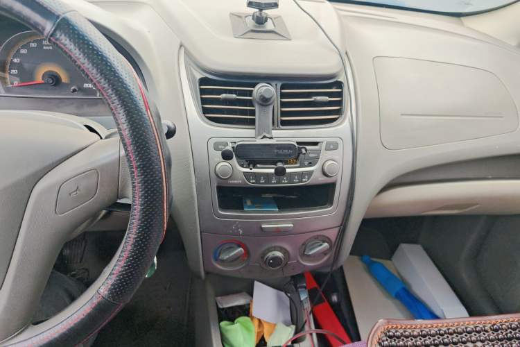 Used Chevrolet Sail 2013 Sedan 1.4L Manual Happiness Edition II Audio And AC Panel