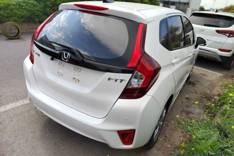 Used Honda Fit 2016 1.5L LX CVT Comfort Model Rear Right 45 Deg