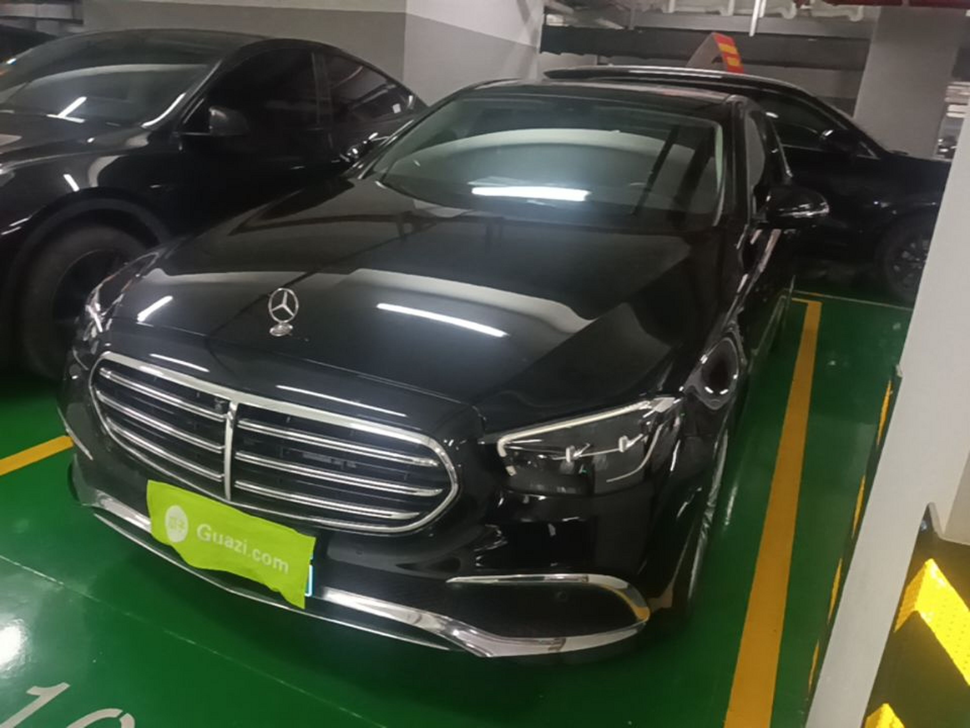 Under the front of the car
