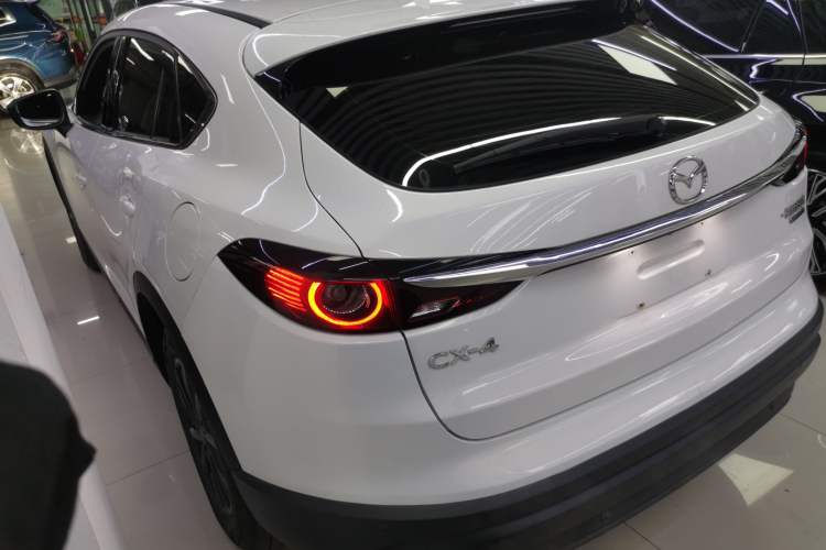 Used Mazda CX-4 2021 2.0L Automatic Two-Wheel Drive Blue Sky Exploration Edition Rear Left 45 Deg