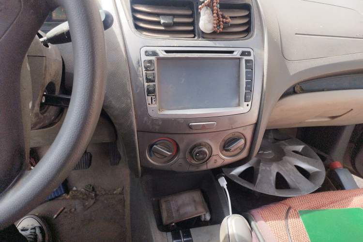 Used Chevrolet Sail 2013 Sedan 1.2L AMT Ideal Edition Audio And AC Panel