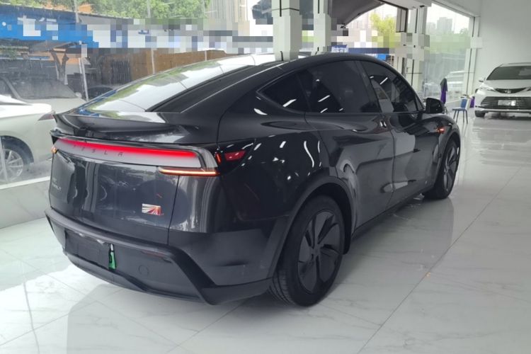 Used Tesla Model Y 2025 Rear-Wheel Drive First Edition Rear Right 45 Deg