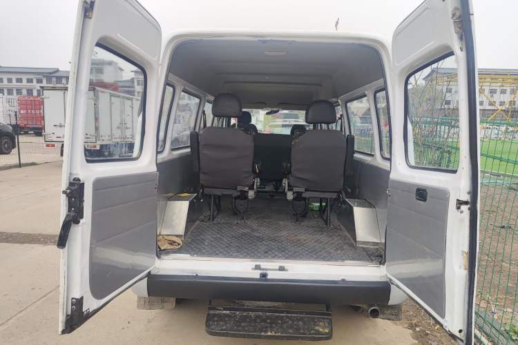 Used JMC Transit 2019 2.8T Commercial Version Long Wheelbase Mid-Roof 7-Seater Rear Single Tire China VI Emission Standard – JX493
