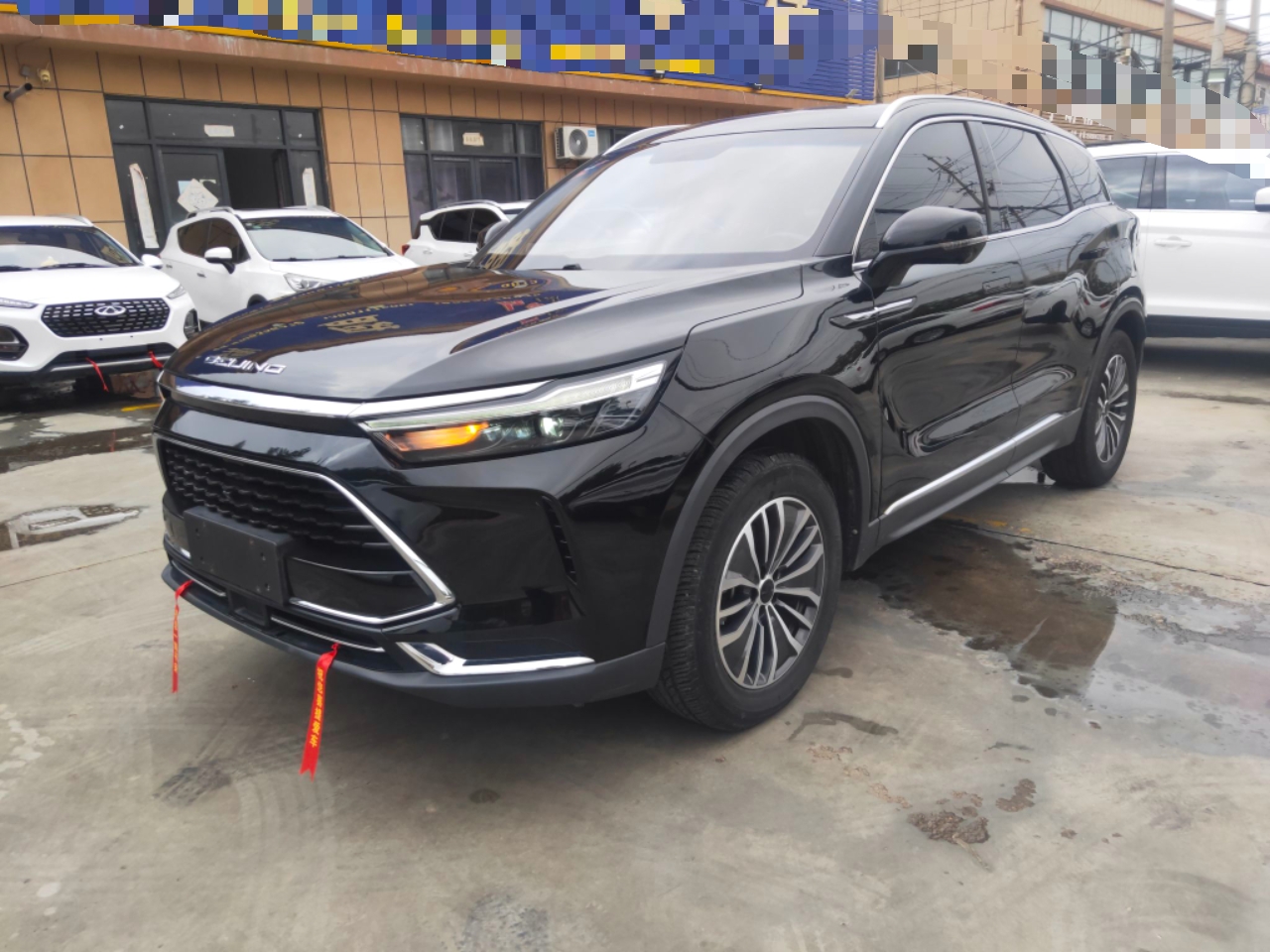 Под передней частью автомобиля