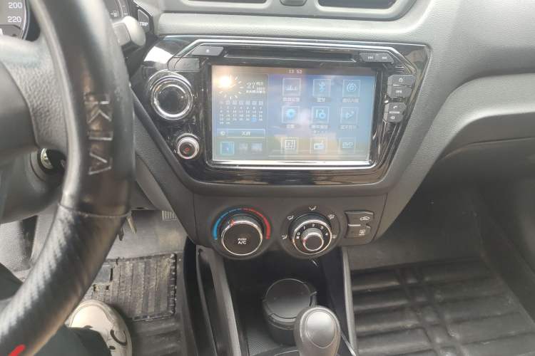 Used Kia K2 2012 Sedan 1.4L Automatic GLS Commemorative Edition Audio And AC Panel