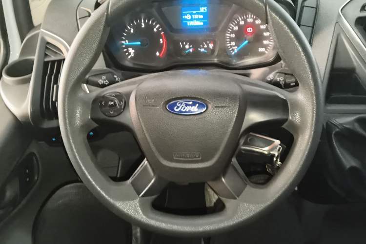 Used Ford Transit 2020 2.0T Diesel Multi-Function Commercial Vehicle Mid-Chassis Low-Roof Design with Dual Rear Doors Meeting China VI Emission Standards Steering Wheel