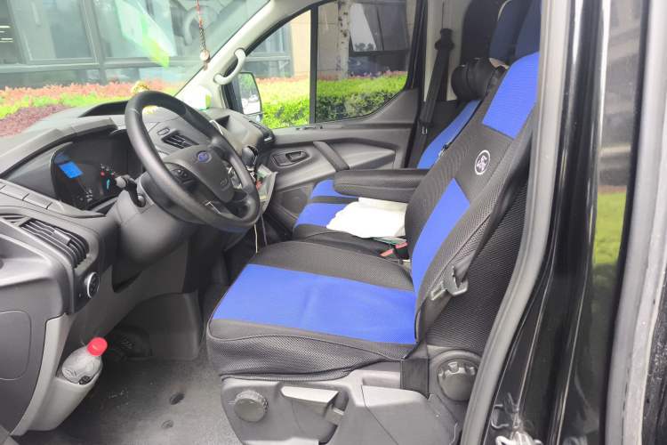 Used Ford Transit 2020 2.0T Diesel Multi-Function Commercial Vehicle Mid-Chassis Low-Roof Design with Dual Rear Doors Emission Standard China V Left Front Seat