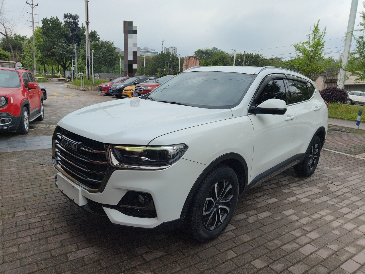 Под передней частью автомобиля