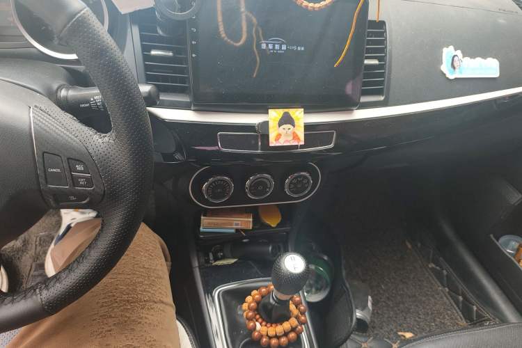 Used Mitsubishi Lancer EX 2016 1.8L Manual Black-and-White Retro Edition Audio And AC Panel