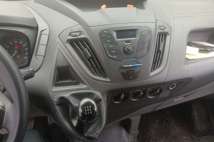 Used Ford Transit 2020 2.0T Diesel Multi-Function Commercial Vehicle Mid-Chassis Low-Roof Design with Dual Rear Doors Meeting China VI Emission Standards Audio And AC Panel