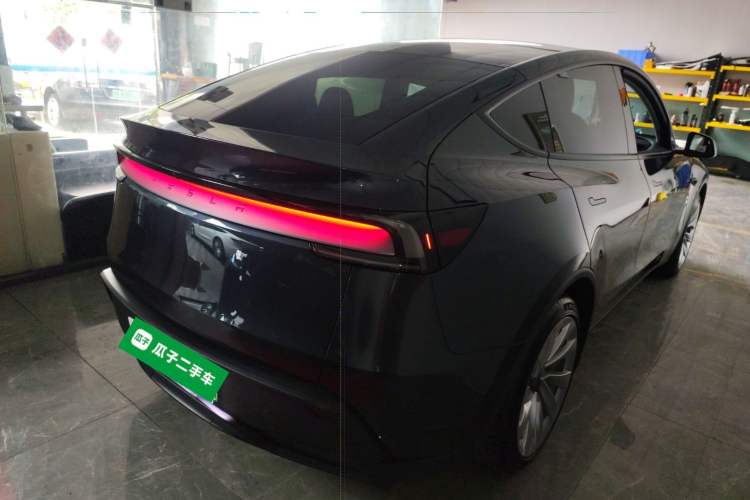 Used Tesla Model Y 2025 Long-Range All-Wheel Drive First Edition Rear Right 45 Deg