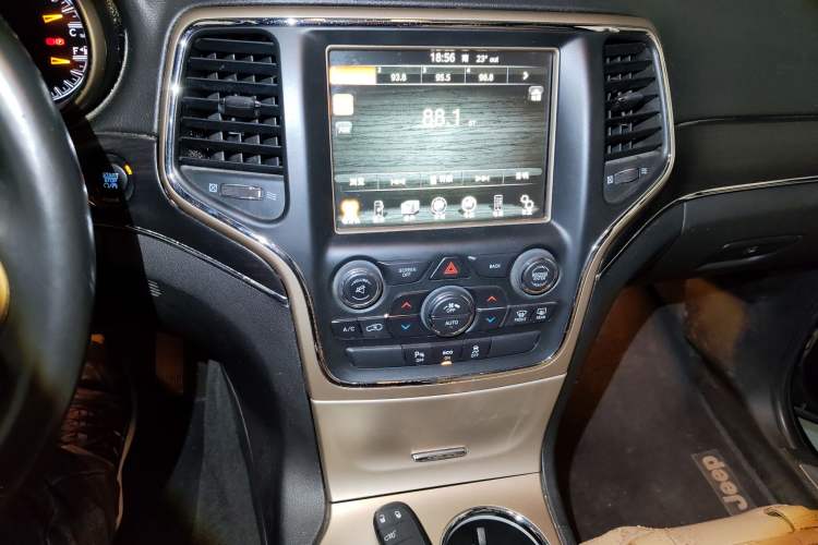Used Jeep Grand Cherokee 2014 3.6L Elite Navigation Edition Audio And AC Panel