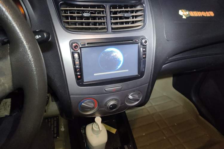 Used Chevrolet Sail 2013 Sedan 1.4L Manual Ideal Happiness Edition Audio And AC Panel