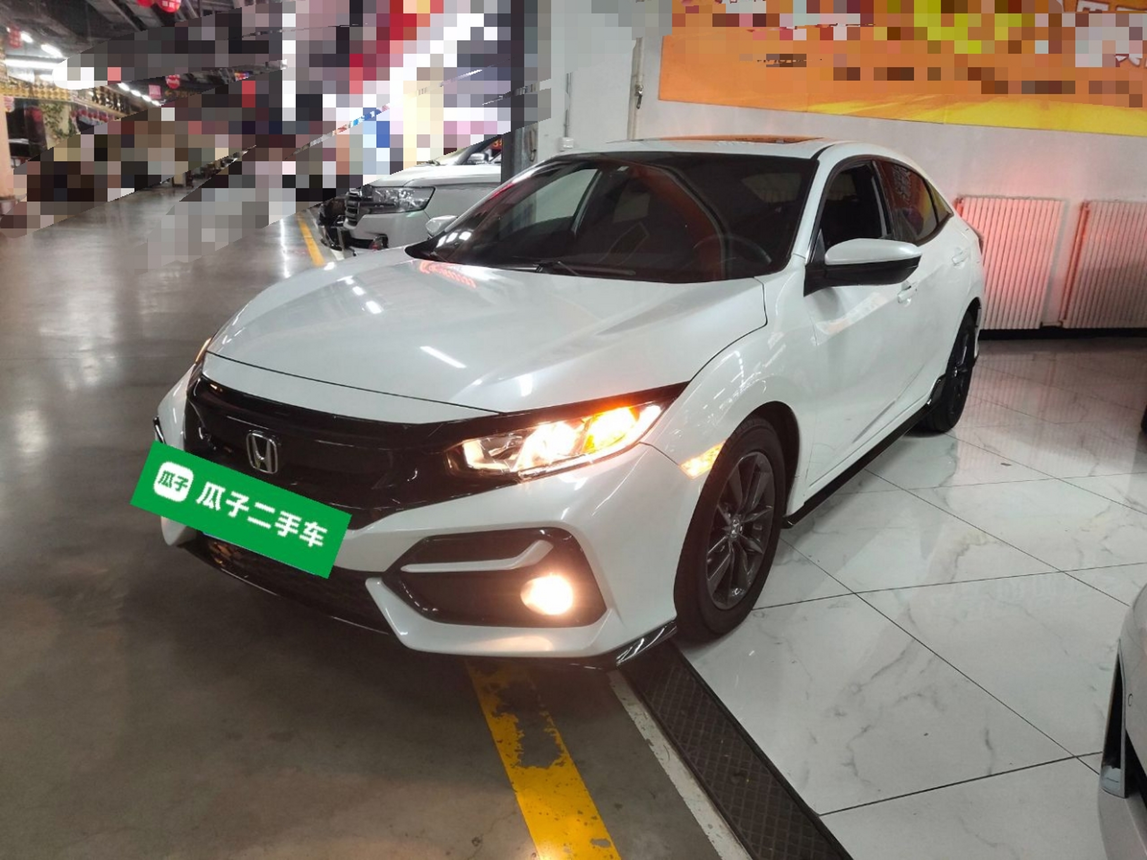 Под передней частью автомобиля