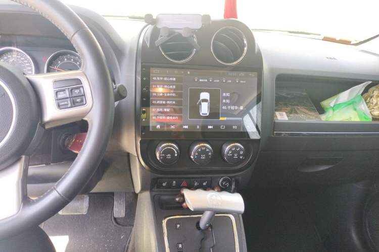 Used Jeep Patriot 2014 2.4L Luxury Navigation Edition Audio And AC Panel