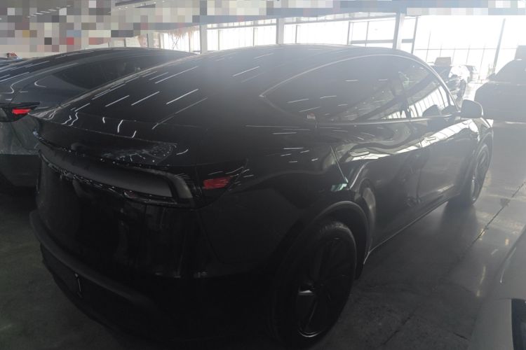 Used Tesla Model Y 2025 Rear-Wheel Drive First Edition Rear Right 45 Deg