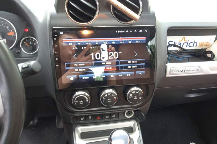 Used Jeep Compass 2014 2.4L four-wheel drive luxury version Audio And AC Panel