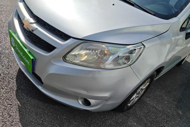 Used Chevrolet Sail 2013 Sedan 1.2L Manual Fashionable Happiness Edition Left Front Headlight