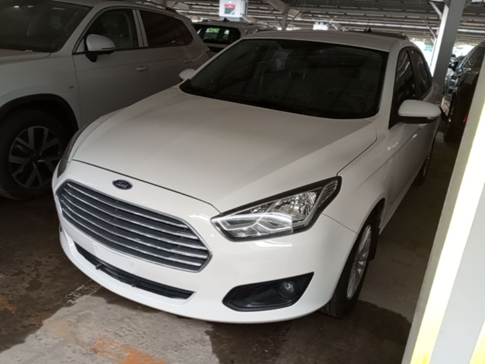 Under the front of the car