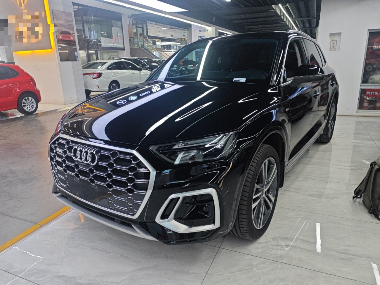 Под передней частью автомобиля