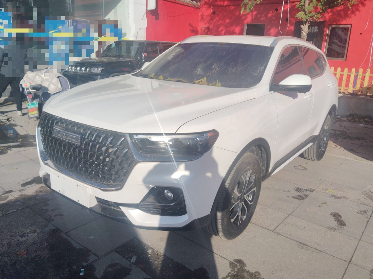 Под передней частью автомобиля
