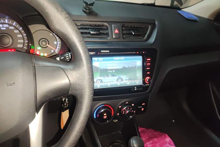 Used Kia K2 2012 Sedan 1.4L Automatic GLS Commemorative Edition Audio And AC Panel